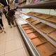 A supermarket shelf usually stocked with fish is stripped bare as people panic buy food supplies in preparation for the arrival of Super Typhoon Mangkhut, in a supermarket in Hang Hau, Tseung Kwan O, New Territories, Hong Kong, China, 15 September 2018. Experts say Super Typhoon Mangkhut will be the most powerful tropical storms to hit Hong Kong in decades.